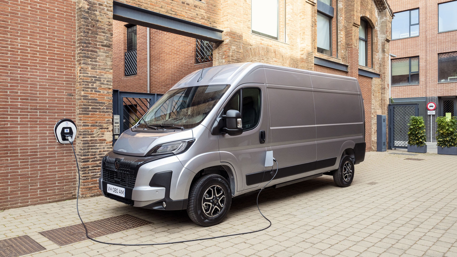 PEUGEOT BOXER charging on a private charging station.